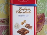 Шоколад Reber молочный с ореховым и кремовым пралине