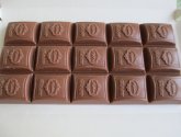 Шоколад Reber молочный с ореховым и кремовым пралине
